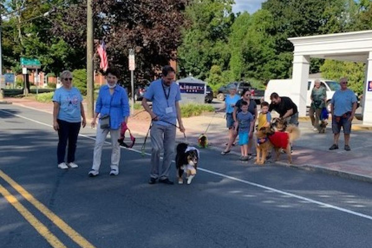Dog and owners in parade